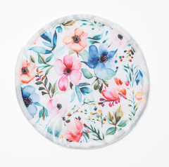Floral printed outer layer of a CAE reusable bamboo nursing pad